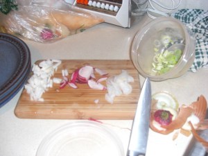Asian turnip, baby belle radishe, daikon radish, and green onions for salad topping