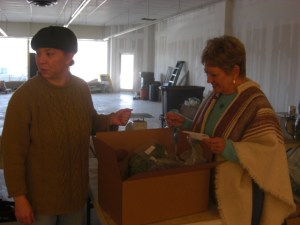 Member Dianne Cox seems pleased with her weekly order.